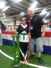 Ms. Delos Reyes after winning Grand Champion at GM Forts tournament