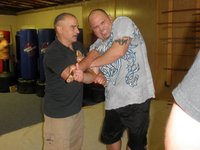 GM Chris Petrilli (doce Pares) with Howard Scrivens (San Soo)